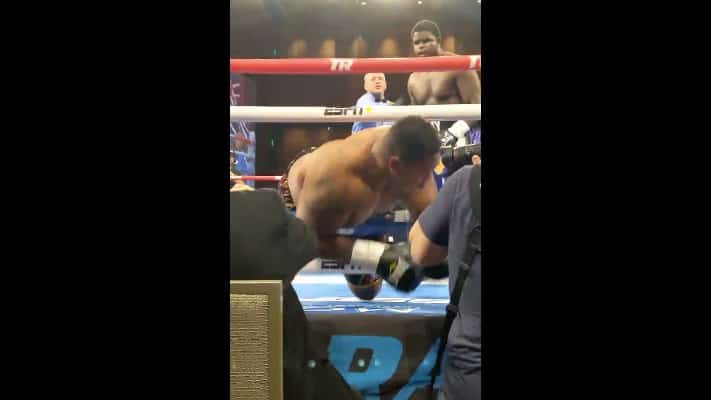 Watch: Heavyweight Boxer Knocked Silly Outside Of Ring During Fight